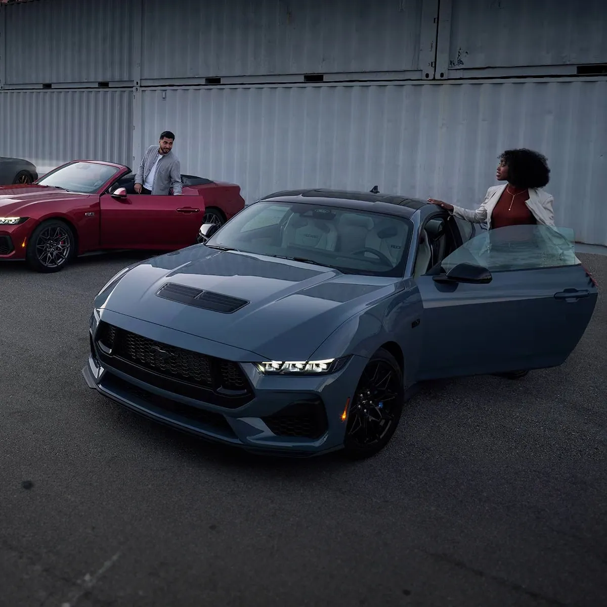 Milbank Ford, Inc. in Milbank SD couple with their new Mustangs